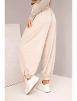 Dámske široké nohavice so zaväzovaním v spodnej časti béžové