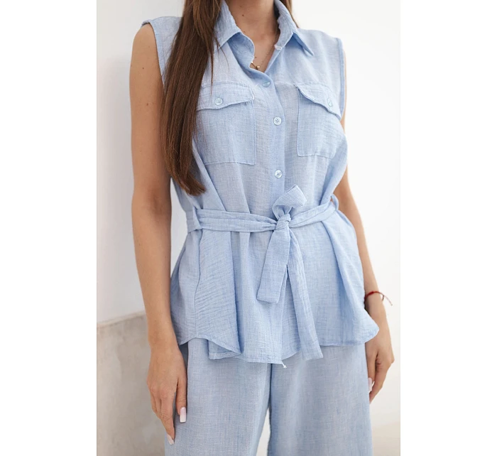 Dámska súprava s uzlovou blúzkou a širokými nohavicami modrej farby