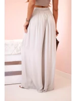 Dámske široké viskózové nohavice s elastickým pásom tmavo béžové Dámske široké viskózové nohavice s elastickým pásom tmavo béžové
