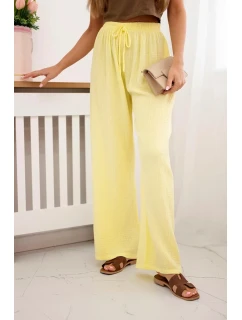 Mušelínové nohavice so širokými nohavicami žltej farby