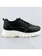 Černé dámské sneakersy s lemovkou model 17139088 Černé dámské sneakersy s lemovkou model 17139088