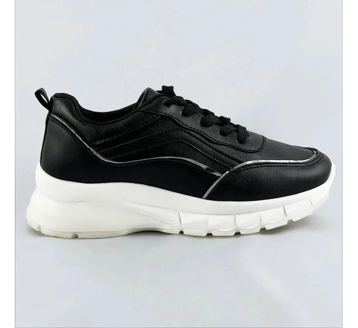 Černé dámské sneakersy s lemovkou model 17139088 Černé dámské sneakersy s lemovkou model 17139088