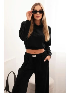 Dámska velúrová tepláková súprava so širokými nohavicami a kapucňou čierna