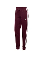 Dámske nohavice adidas Essentials 3-Stripes Fleece Slim v bordovej farbe KF8321 Dámske nohavice adidas Essentials 3-Stripes Fleece Slim v bordovej farbe KF8321