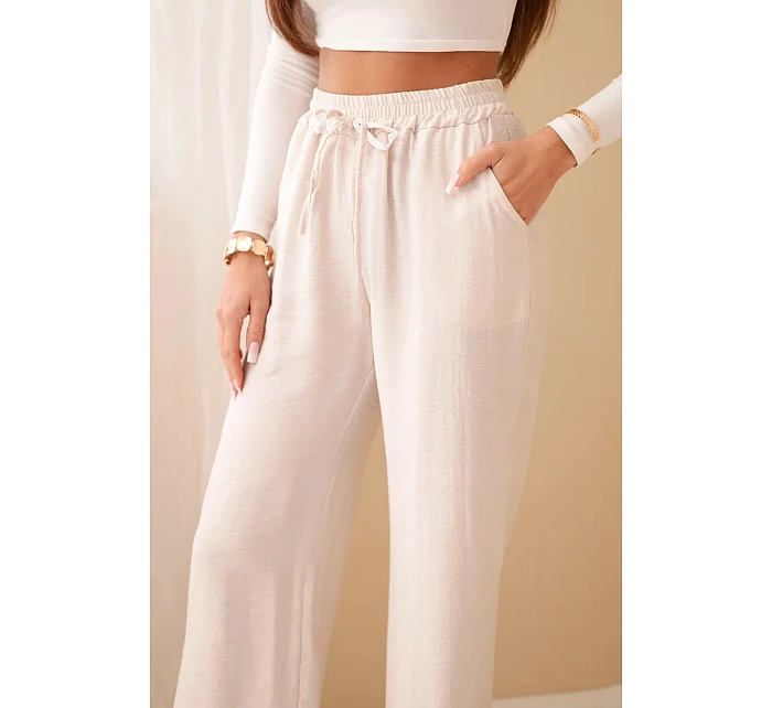 Široké viskózové nohavice béžovej farby