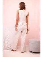 Dámská kombinéza bez rukávů s širokými nohavicemi a ozdobnými knoflíky béžový