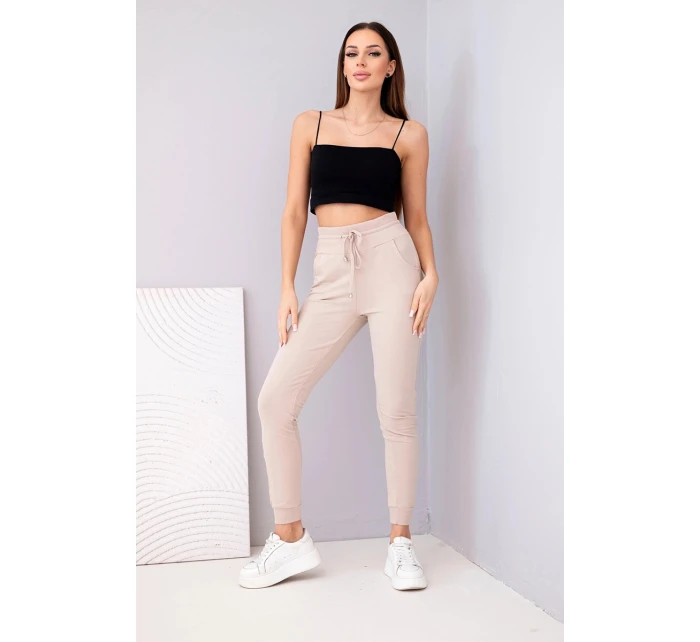 Dámské teplákové kalhoty s vysokým pasem a šňůrkou béžové