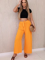 Široké nohavice v páse oranžové