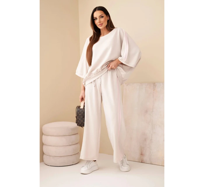 Dámsky maslový viskózový komplet so širokými nohavicami a voľnou blúzkou béžovej farby