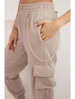 Dámské bavlněné cargo kalhoty s kapsami a řetízkem béžové Dámské bavlněné cargo kalhoty s kapsami a řetízkem béžové