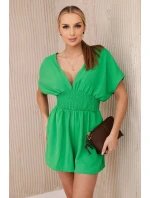 Kombinéza s volánikmi v páse jasne zelená Kombinéza s volánikmi v páse jasne zelená