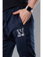 Tmavě modré pánské teplákové kalhoty s potiskem model 18347905 - J.STYLE Tmavě modré pánské teplákové kalhoty s potiskem model 18347905 - J.STYLE