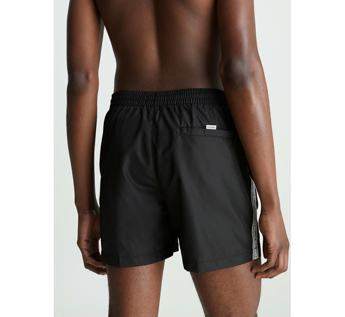 Pánske plavky Medium Drawstring Swim Shorts Logo Tape KM0KM00741BEH čierna - Calvin Klein