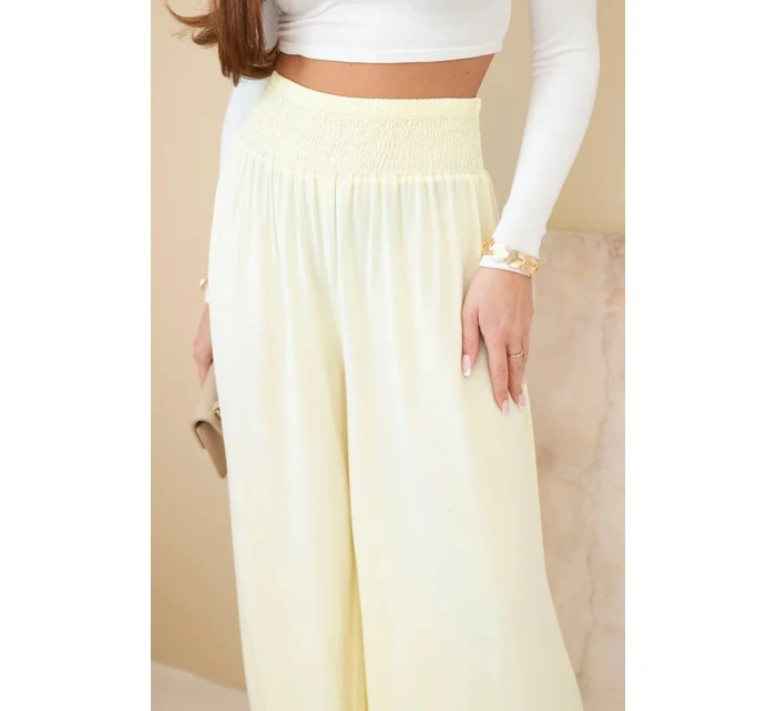 Dámske viskózové nohavice s elastickým pásom žlté