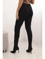 Dámske bavlnené nohavice so zaväzovaním v páse a zúženými nohavicami čierne Dámske bavlnené nohavice so zaväzovaním v páse a zúženými nohavicami čierne