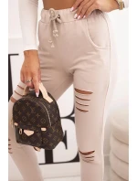 Dámské kalhoty z bavlny s model 21768710 a gumou v pase béžové - K-Fashion Dámské kalhoty z bavlny s model 21768710 a gumou v pase béžové - K-Fashion
