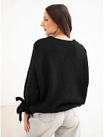 Dámský oversize svetr se šňůrkami u rukávů černý Dámský oversize svetr se šňůrkami u rukávů černý