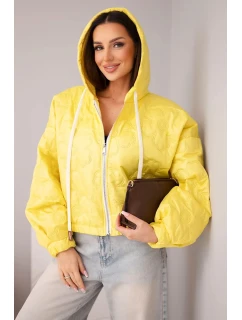 Dámska prešívaná bunda s kapucňou a ozdobnou kvetinovou potlačou žltá
