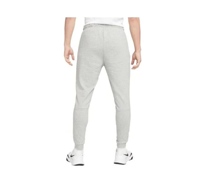 Pánske tréningové nohavice Dri-Fit Trapered M CZ6379-063 sivé - Nike Pánske tréningové nohavice Dri-Fit Trapered M CZ6379-063 sivé - Nike