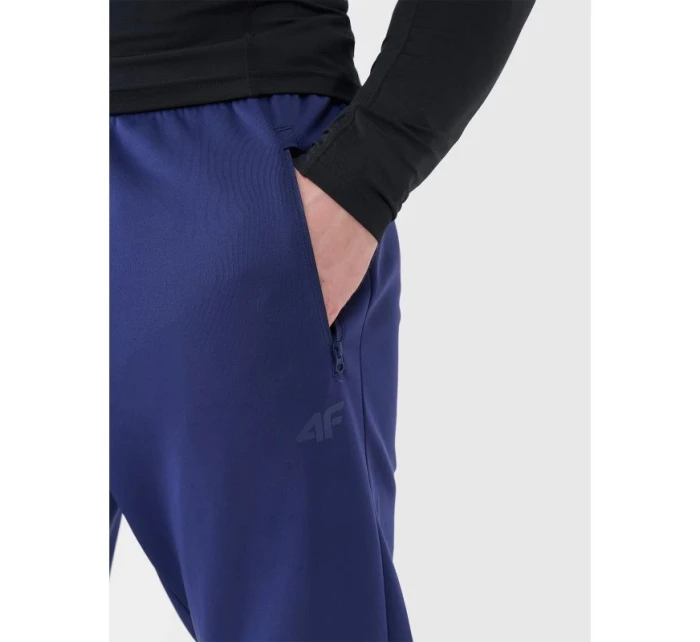 Pánske rýchloschnúce tréningové nohavice 4F 4FWSS25TFTRM0836-30S Pánske rýchloschnúce tréningové nohavice 4F 4FWSS25TFTRM0836-30S