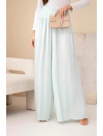 Dámske široké nohavice z viskózy s elastickým pásom mätovej farby
