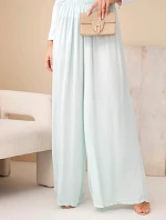 Dámske široké nohavice z viskózy s elastickým pásom mätovej farby