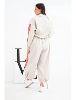 Dámská bavlněná souprava s oversized kalhotami a model 22294706 lampasy béžová - K-Fashion Dámská bavlněná souprava s oversized kalhotami a model 22294706 lampasy béžová - K-Fashion