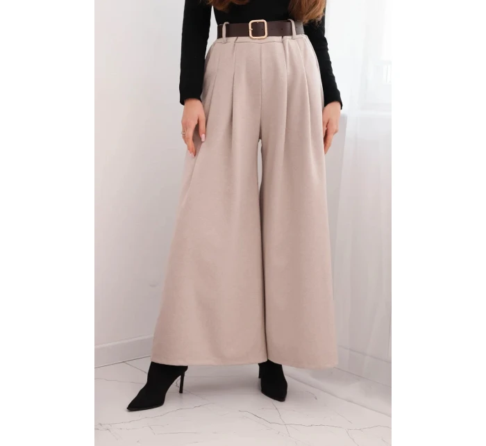 Dámske široké nohavice s opaskom béžovej farby