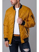 Tmavě žlutá prošívaná pánská bunda typu "bomber" model 18344839 - J.STYLE Tmavě žlutá prošívaná pánská bunda typu "bomber" model 18344839 - J.STYLE