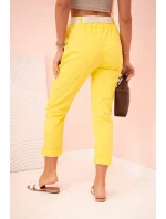 Dámske viskózové nohavice s opaskom a rozšírenými nohavicami tmavo žlté Dámske viskózové nohavice s opaskom a rozšírenými nohavicami tmavo žlté