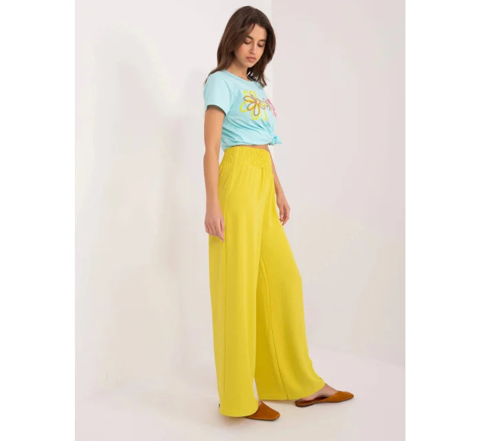 Žluté široké dámské kalhoty s gumou v pase model 20102265 - Factory Price