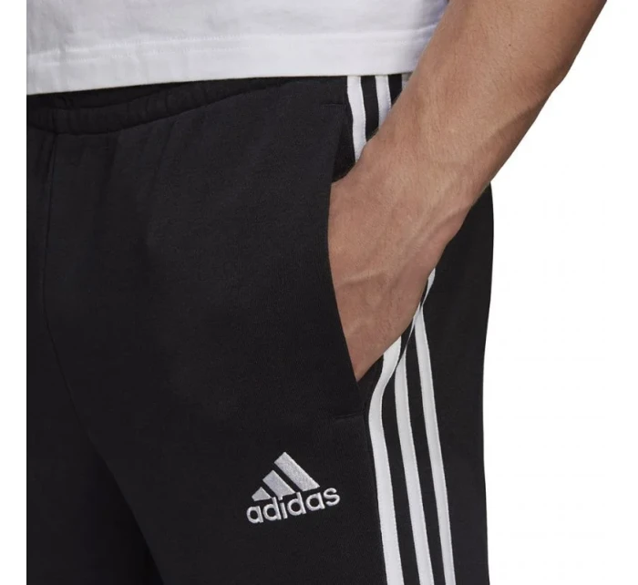 Pánske nohavice Essentials Tapered Cuff 3 Stripes M GK8831 - Adidas Pánske nohavice Essentials Tapered Cuff 3 Stripes M GK8831 - Adidas