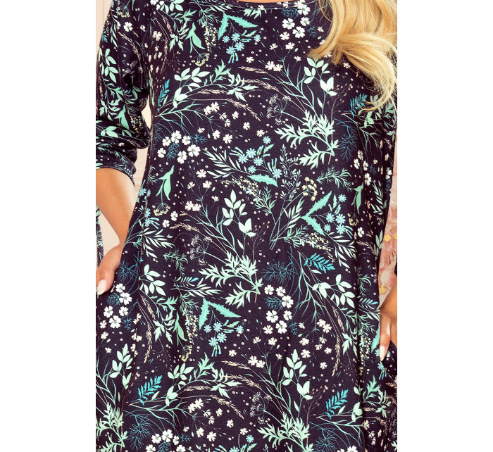 SOPHIE - Pohodlné dámske oversize šaty so vzorom listov v mätovej farbe na tmavom pozadí 281-4