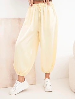 Dámske široké nohavice s elastickým pásom a viazaním v štýle aladina žlté