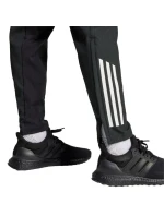 Kalhoty Tiro 25 Competition Presentation W model 21281980 dámské - ADIDAS