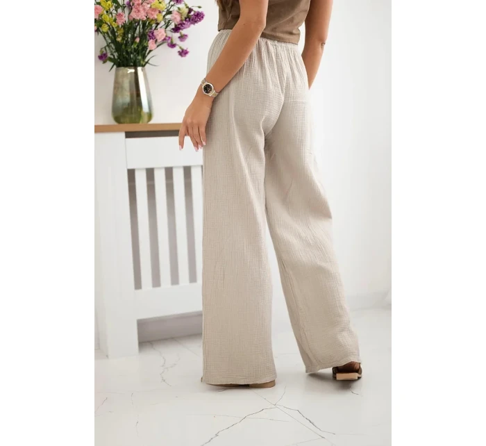 Široké mušelínové nohavice béžovej farby