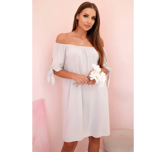 Dámske viskózové šaty s viazaním na rukávoch béžovej farby Dámske viskózové šaty s viazaním na rukávoch béžovej farby