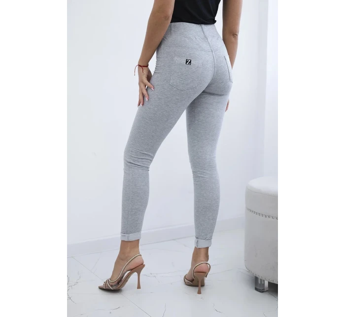 Bavlnené nohavice so zirkónmi na zadných vreckách sivé Bavlnené nohavice so zirkónmi na zadných vreckách sivé