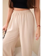 Široké nohavice tmavobéžovej farby
