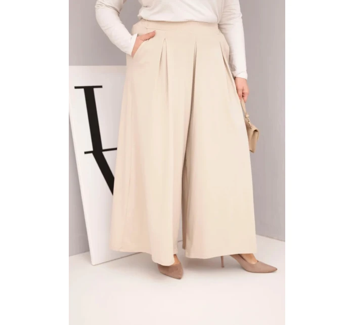 Dámské bavlněné kalhoty Plus Size s širokými nohavicemi a volným střihem béžové Dámské bavlněné kalhoty Plus Size s širokými nohavicemi a volným střihem béžové