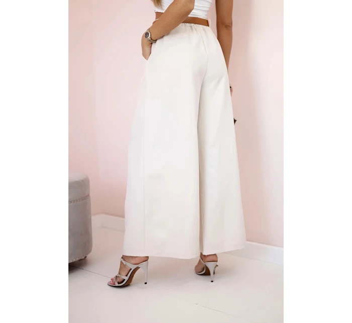 Široké kalhoty s páskem béžový