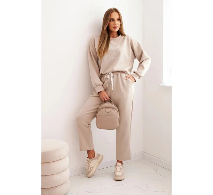 Dámska súprava z viskózy s ozdobným motívom a nohavicami béžová Dámska súprava z viskózy s ozdobným motívom a nohavicami béžová
