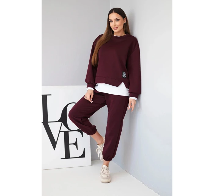Dámska súprava s maslovou voľnou mikinou a teplákmi slivka Dámska súprava s maslovou voľnou mikinou a teplákmi slivka