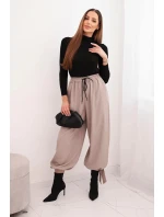 Dámske nohavice so širokými nohavicami a spodným viazaním fango Dámske nohavice so širokými nohavicami a spodným viazaním fango