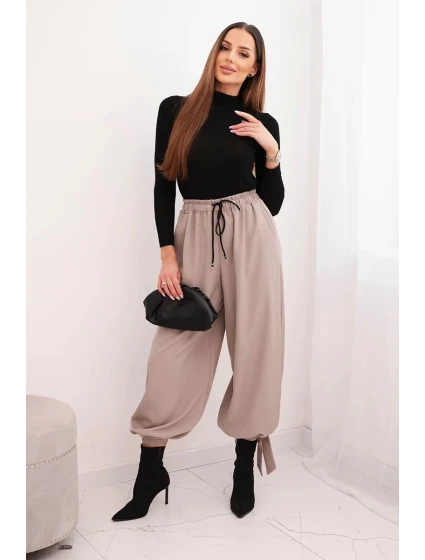 Dámske nohavice so širokými nohavicami a spodným viazaním fango Dámske nohavice so širokými nohavicami a spodným viazaním fango