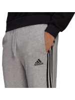 Adidas Essentials Elastické nohavice so zúženými manžetami a 3 prúžkami M GK9001