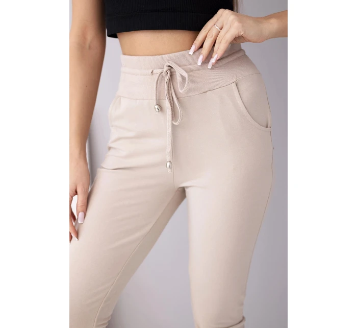 Dámské teplákové kalhoty s vysokým pasem a šňůrkou béžové