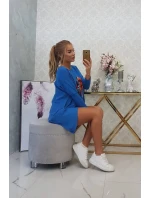 Oversize halenka s potiskem model 18743434 rtů chrpově modrá - K-Fashion Oversize halenka s potiskem model 18743434 rtů chrpově modrá - K-Fashion