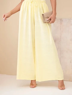 Dámské široké bavlněné kalhoty s gumičkou v pase žluté