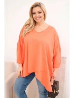 Dámska bavlnená blúzka s asymetrickým lemom a výstrihom do V v marhuľovej farbe Dámska bavlnená blúzka s asymetrickým lemom a výstrihom do V v marhuľovej farbe